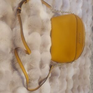 Michael Kors Yellow Crossbody Bag with Detachable Strap and Modern Design